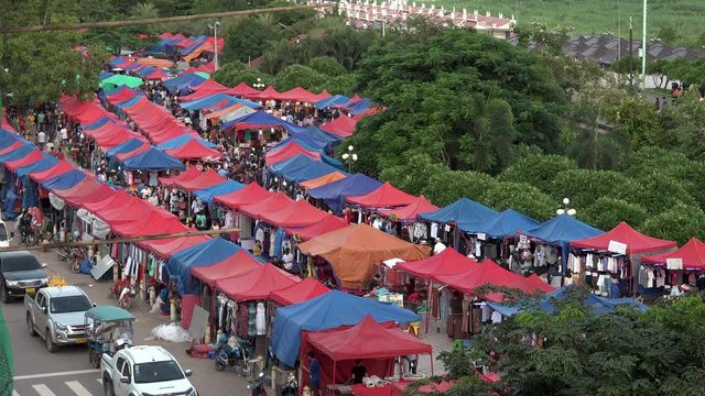  VIENTIANE,  LAOS - CIRCA AUGUST 2018 : Scenery of NIGHT MARKET at the riverside of MEKONG RIVER.