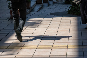 The sidewalk of the summer afternoon