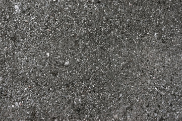 Black asphalt texture background.