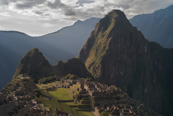 Machu Picchu Ruins and Huayna Picchu Mountain Aerial View