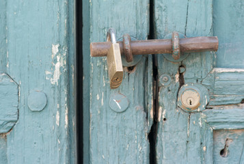 Picturesque Lock on a Green Door in Cuzco, Peru
