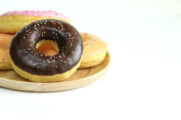 Donuts on white table background.