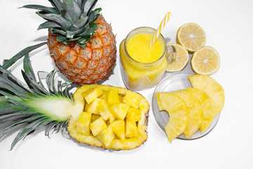 Still life. Pineapple juice, cocktails with fresh pineapple for breakfast in the morning on a white background. Detox. For health and for weight loss.