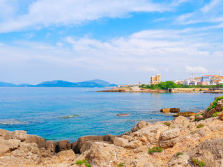 Fototapeta na wymiar View of the sea and the city of Alghero. Sardinia, Italy
