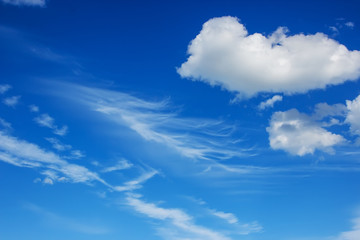 Naklejka na ściany i meble View on beautiful white clouds in a blue sky