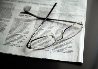 Glasses On Newspaper Close-up