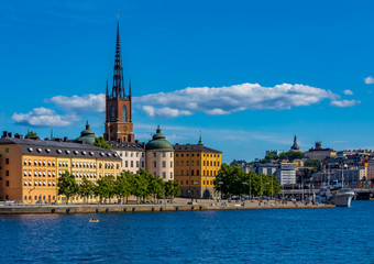 Fototapeta premium View onto Stockholm old town Gamla Stan and Riddarholmen church in Sweden