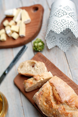 Preparation of sandwich with butter, cheese and red fish
