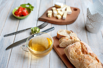 Preparation of sandwich with butter, cheese and red fish