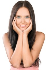 Fototapeta premium Beautiful brunette with head in hands