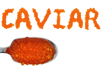 Small red fish eggs form the word CAVIAR. Spoon with red sturgeon caviar. Isolated white background