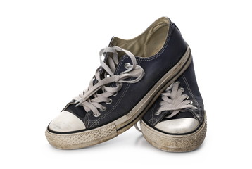 Old blue shoes, sneakers isolated on white background