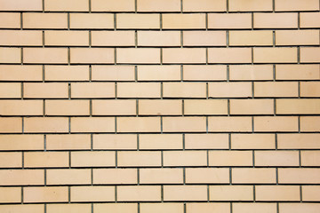 Obraz premium Yellow bricks in the wall as an abstract background