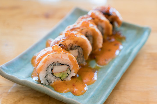 Philadelphia roll sushi with salmon, prawn, avocado, cream cheese. Sushi menu. Japanese food.
