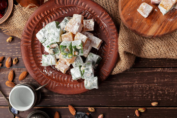 Turkish delight on a wooden table.