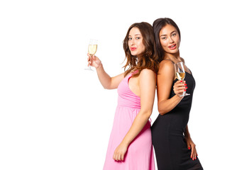 Fototapeta na wymiar young womans with a champagne glasses at celebration