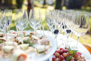 Champagne glasses on gold background. Party and holiday celebration concept.