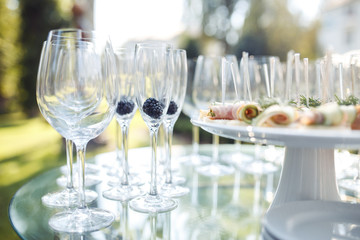 Champagne glasses on gold background. Party and holiday celebration concept.