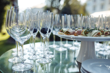 Champagne glasses on gold background. Party and holiday celebration concept.