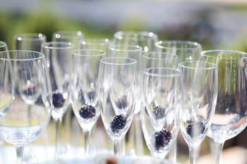 Champagne glasses on gold background. Party and holiday celebration concept.