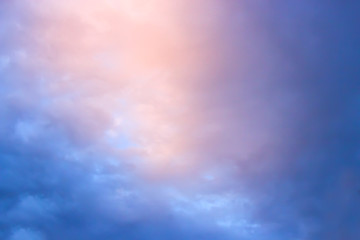 View on beautiful clouds in a pink blue sky.