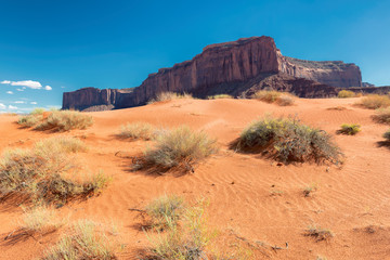 Sand dunes in Monument Valley at summertime in Arizona - Utah, USA