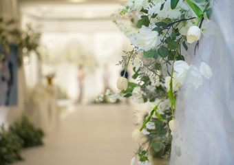 Beautiful white wedding backdrop with white flower. Wedding decor ,Blur background copy space.
