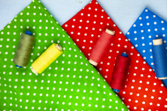 Coils with threads and multi-colored fabrics