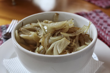 Dumplings with cabbage and fried onions