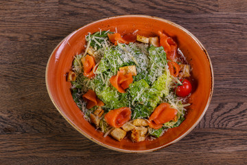 Caesar salad with salmon