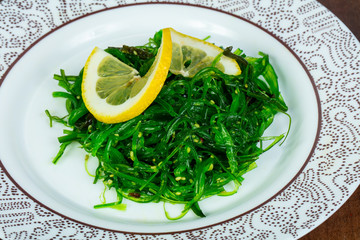 Chuka salad served lemon