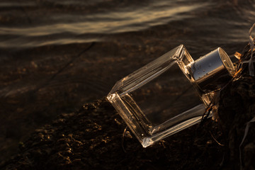 Perfume bottles located on the beach