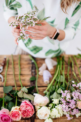 Florist makes a bouquet.