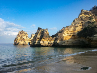 Fototapeta na wymiar Rocks ranging from the beachinto the sea