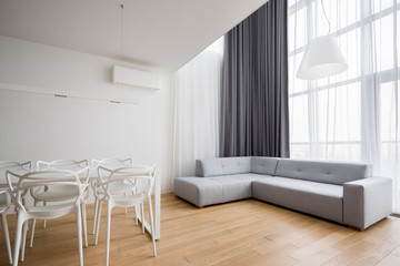 Home interior with corner sofa