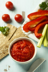 Roasted pepper dip with crisps and vegetables