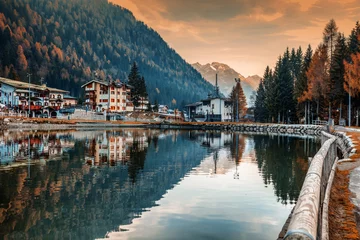 Foto op Plexiglas Dolomieten A small town in the Dolomites Italian Alps, a lake, a beautiful urban natural autumn landscape, Madonna di Campiglio