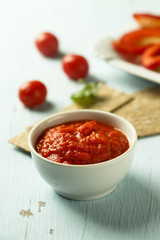 Roasted pepper dip with crisps and vegetables