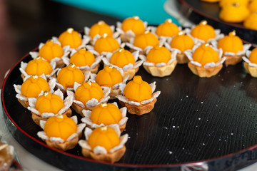 Golden Crown Candy a dessert of Thailand Candy Gold, placed on a tray.