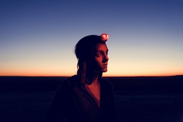 Traveler woman wearing headlamp