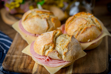 Sandwich with cheese and ground ham.