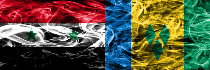 Syria vs Saint Vincent and the Grenadines smoke flags placed side by side. Thick colored silky smoke flags of Syrian and Saint Vincent and the Grenadines