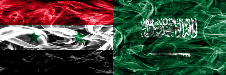 Syria vs Saudi Arabia smoke flags placed side by side. Thick colored silky smoke flags of Syrian and Saudi Arabia