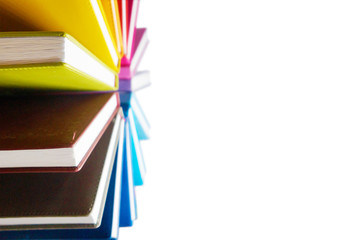 Books. A lot of books with bright covers lined in circle isolated on white background. Place for text. Design element, paper and leather texture, close up     