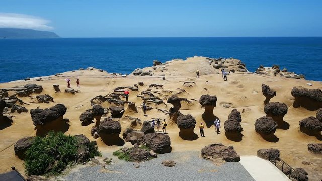 Tourist at the Yehliu Geopark in Wanli District, New Taipei, Taiwan