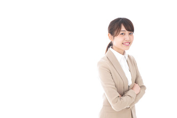 腕を組むビジネスウーマン