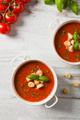 Traditional tomato soup, served with croutons.