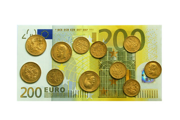 gold coins on a euro banknote