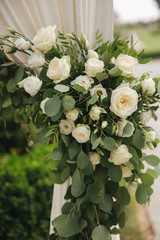 Obraz na płótnie Canvas Flowers on wedding drcor, green and white color