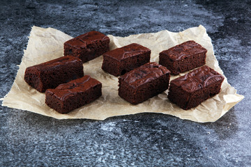 homemade chocolate brownies on grey vintage background, chocolate cake concept